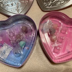 しなこボンボンのピンク缶パープル缶の2個。開封済みで中身在庫あり。の画像