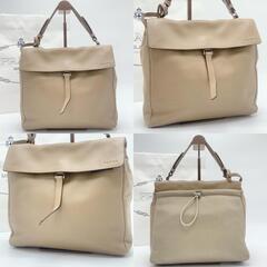 PRADA プラダ ハンドバッグ 腕掛け B10397 ポーチ ナイロン レザー 本革 キャンバス ベージュ 白タグの画像