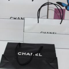 💗未使用品💗シャネルショッパー紙ふくろ３点💗ホワイト２点　ブラック１点　ショップて購入の画像