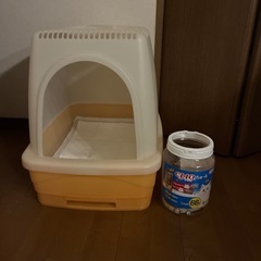 猫用オレンジいろのトイレの画像