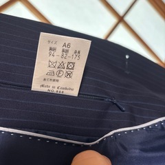 紺ストライプ　スーツ　A6  の画像
