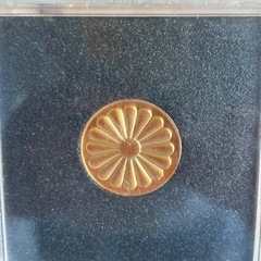 天皇御在位五十年記念コインの画像