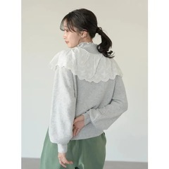 アースミュージックフリルニットの画像