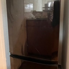 洗濯機と電子レンジと冷蔵庫の画像