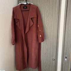 ボタン付きロングコートの画像