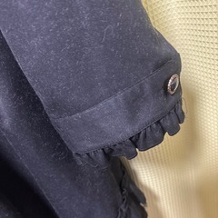 アクシーズファム　黒のコートの画像