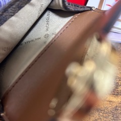 財布マイケルコース 裂け目あり、、の画像