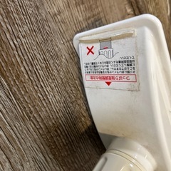 地震の時棚が倒れないようにする突っ張り棒の画像