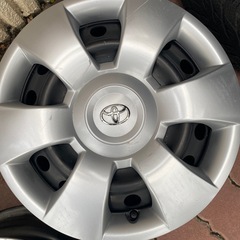 15インチ ブラック スチールホイール 4穴、カバー付きの画像