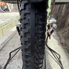 ブリヂストンの電動自転車（チャイルドシート付き）の画像