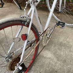 後輪パンクくろすばいくクロスバイクの画像