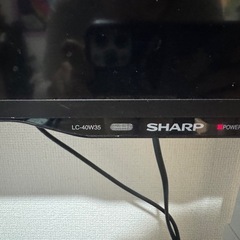 シャープテレビ40V テレビスタンドとテレビ台付きの画像