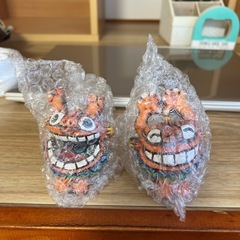 笑顔のシーサーの画像