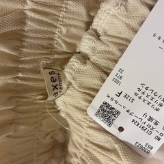 axes femme スカートの画像