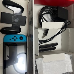 switch本体✖️スマブラ、ポケモンカセットの画像