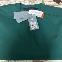 new balance 　ナイロンジャケットの画像