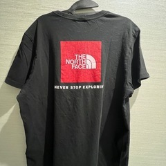 THE NORTH FACEのブラックの半袖Tシャツの画像