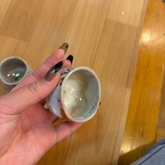 引き取り中コップの画像