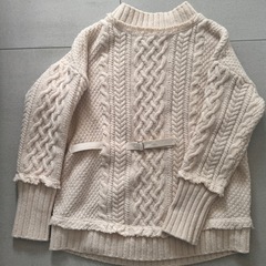 uhr ホワベルト付きニットの画像