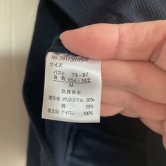 ネイビー　ノーカラージャケットの画像