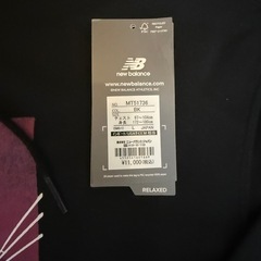 ニューバランス　パーカーの画像