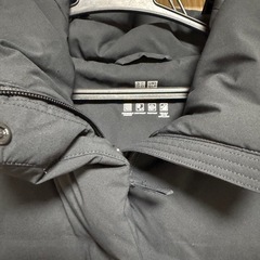 ユニクロ　シームレスダウンロングコート　黒Lの画像