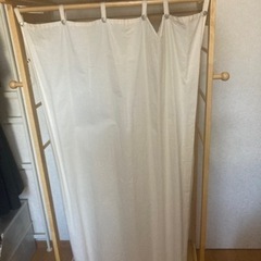 カーテン付洋服ハンガーかけの画像