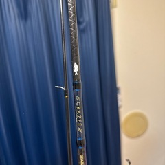 釣竿三本とリールの画像