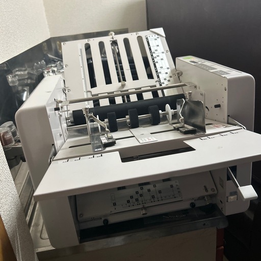 紙折り機