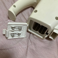 古い小型掃除機の画像