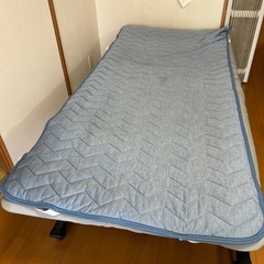 折りたたみベット布団付きの画像