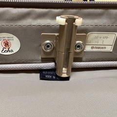 マルエムガーメントバックの画像