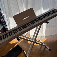 美品✨　持ち運びバック付き ８８鍵盤　電子ピアノ　高さ調節台付きの画像