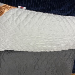 ロング枕、カバー付きの画像
