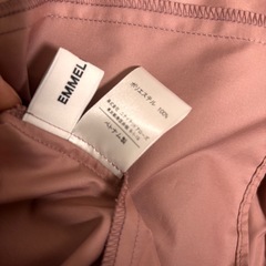 ピンクのトップスの画像