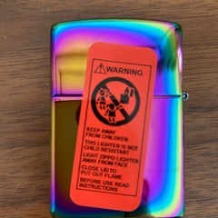 虹色のZippoライター、ローリングストーンズWorld Tour 2002/03モデル。の画像