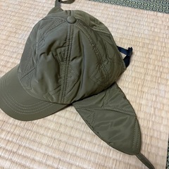 ダークグリーンのキャップの画像