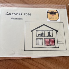 ニャン子のカレンダーとテープの画像