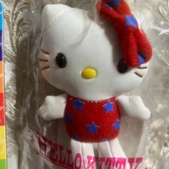 ミニ電卓２つ➕ハローキティーホルダーの画像