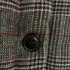 ブラウン系チェック柄ダウンベストの画像