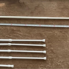 収納ケースと突っ張り棒６本セットの画像