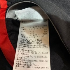 adidasリバーシブルダウンジャケットの画像