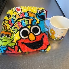 セサミストリート食洗機対応プラコップと巾着の画像
