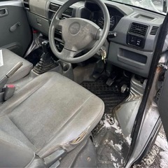 日産クリッパーのシルバーボディ、4WD.の画像