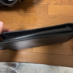 ダイヤルロック付きのダンヒルのクラッチバッグの画像