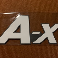 ショウワガレージ　ジムニールーフラックA-xシリーズ   A-x(エークロス) エンブレム 14cm の画像