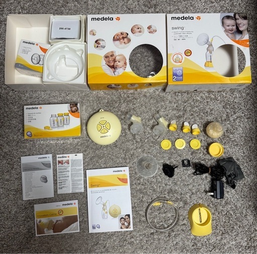 Medela 電動搾乳機【未使用　母乳ボトル3個付き】