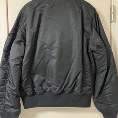 ALPHA INDUSTRIES ブラック ボンバージャケット オレンジ裏地の画像