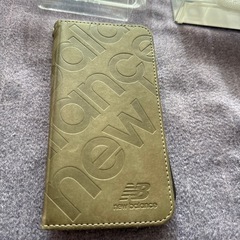 ニューバランスiPhone15.16プロ手帳型ケースの画像