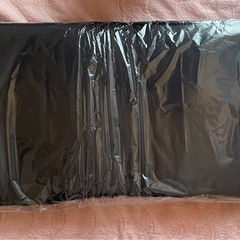 ギャルソン　もふもふロゴロングクッションの画像